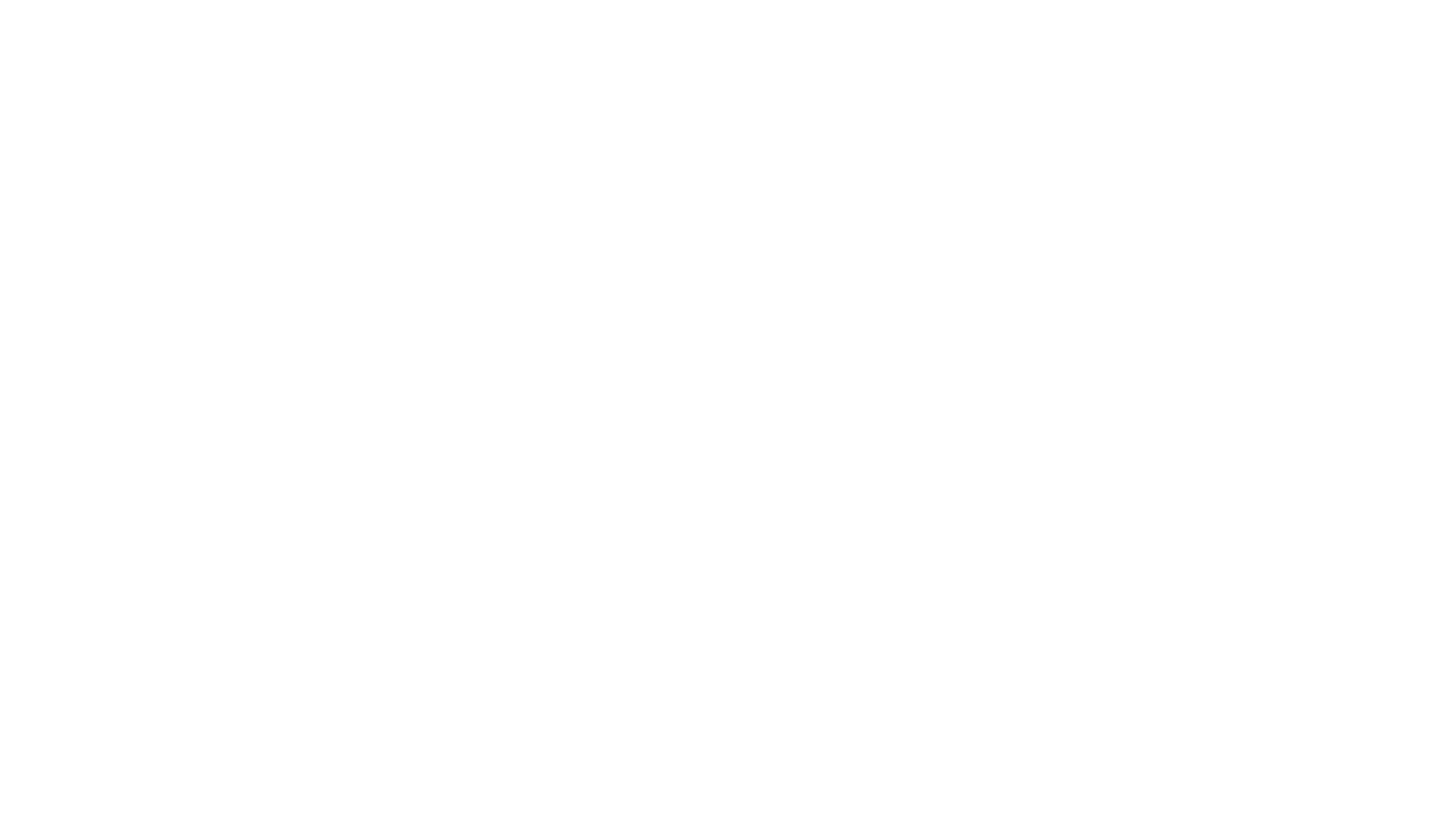 One person at a laptop while the rest of the chairs sit empty